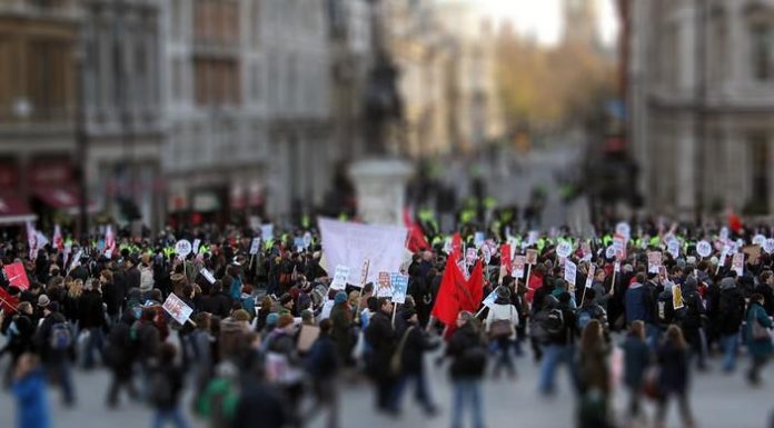 International students protest in Canberra for closing ACT job list